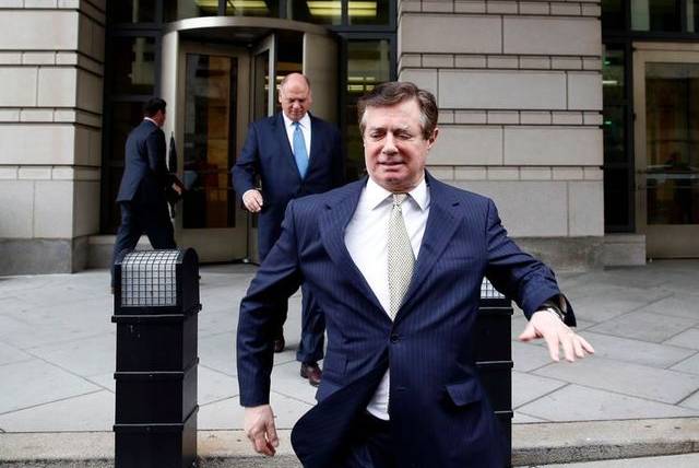 Paul Manafort departing Federal District Court after a hearing in April